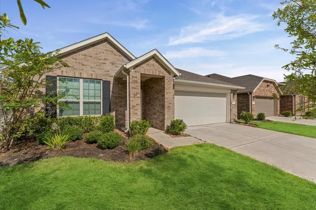 front view of a house and a yard