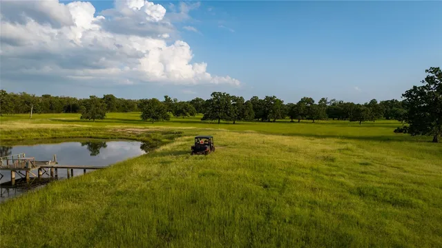 a view of a golf course with a lake