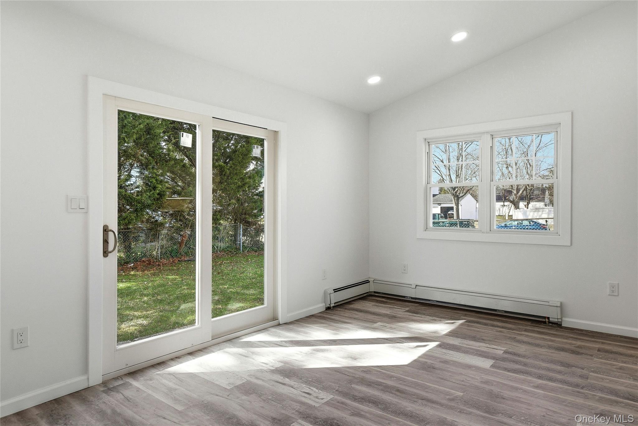 56 Pennaquid Road Coram, NY 11727 - Photo 10 of 29 Dining with sliding glass doors