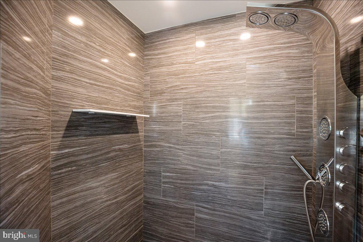 1142 Ranger Ridge Road Lusby, MD 20657 - Photo 27 of 53 a bathroom with a shower