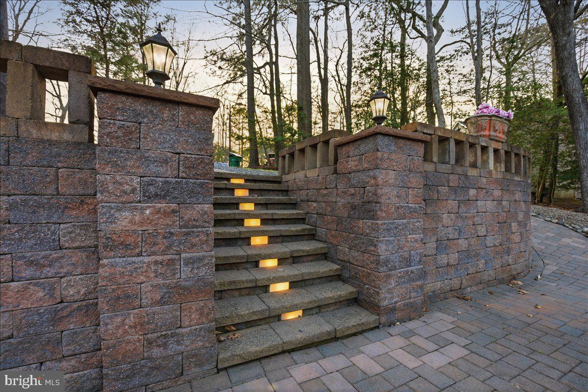 1142 Ranger Ridge Road Lusby, MD 20657 - Photo 3 of 53 a view of house with outdoor space and trees