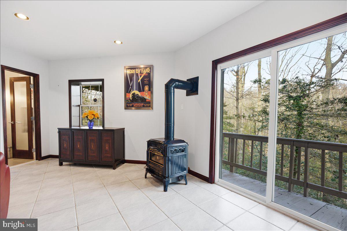 1142 Ranger Ridge Road Lusby, MD 20657 - Photo 35 of 53 a view of workspace with furniture and window