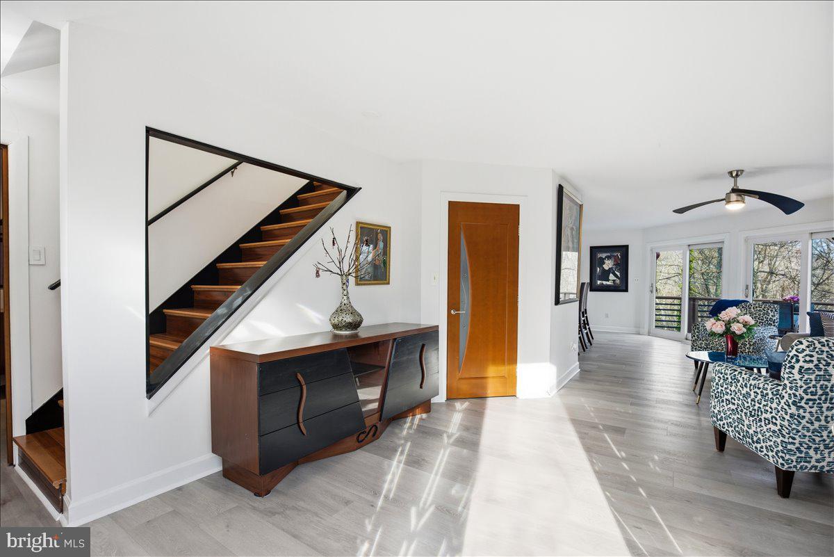 1142 Ranger Ridge Road Lusby, MD 20657 - Photo 7 of 53 a view of entryway and hall with wooden floor
