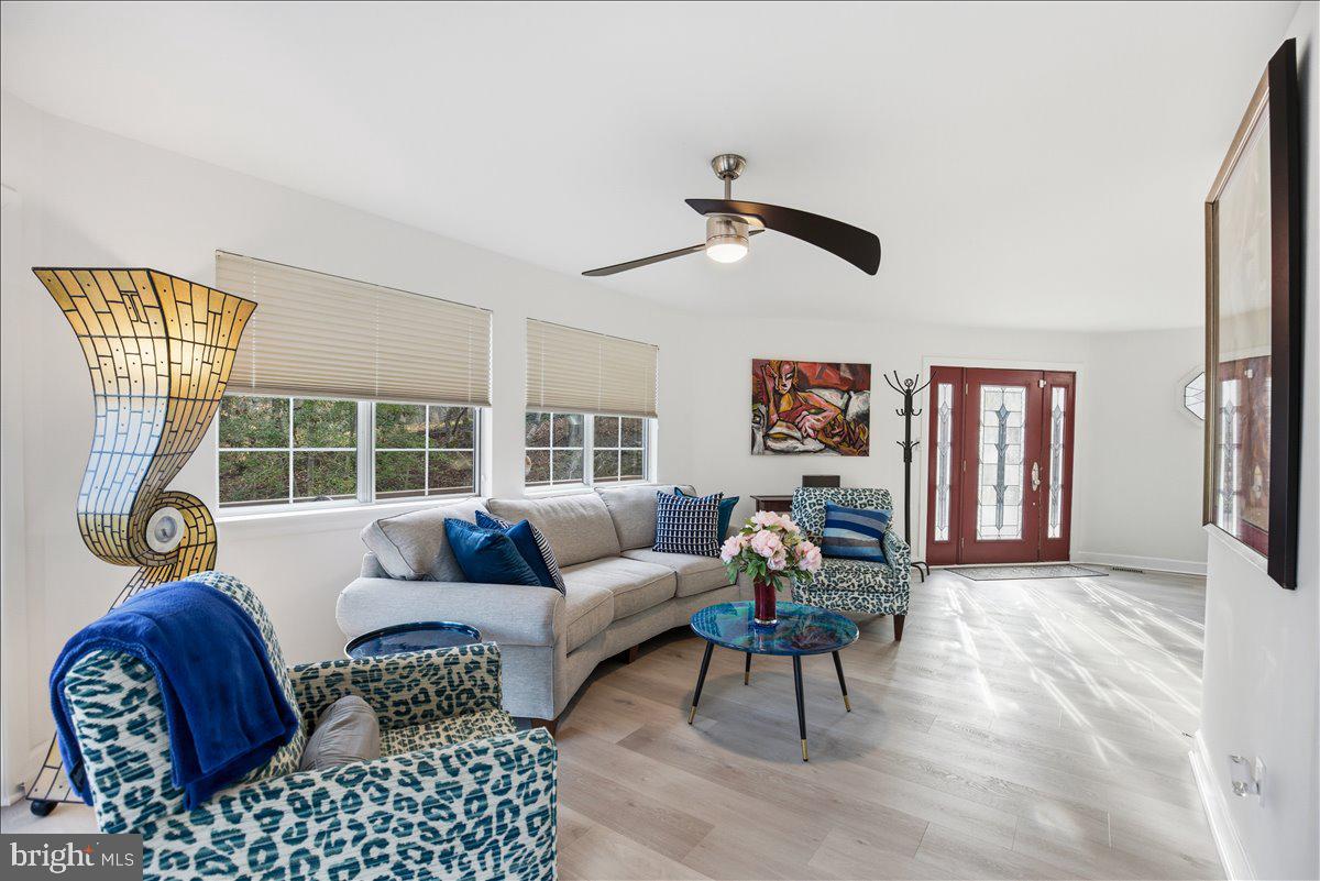 1142 Ranger Ridge Road Lusby, MD 20657 - Photo 8 of 53 a living room with furniture and a window