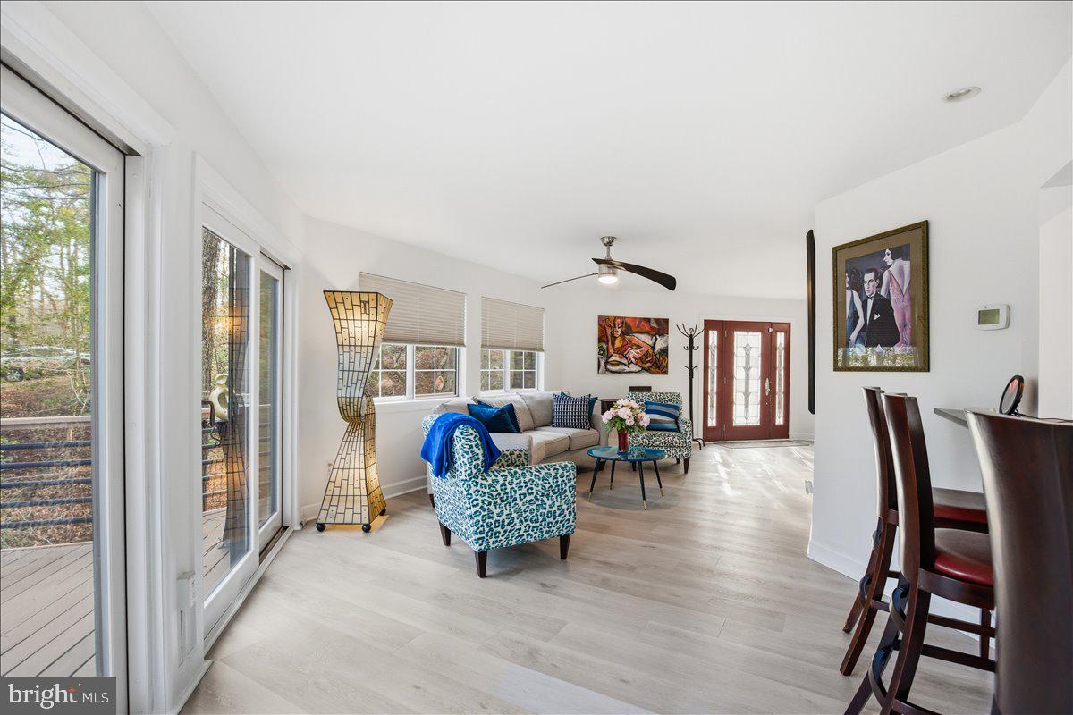 1142 Ranger Ridge Road Lusby, MD 20657 - Photo 9 of 53 a living room with furniture and a large window
