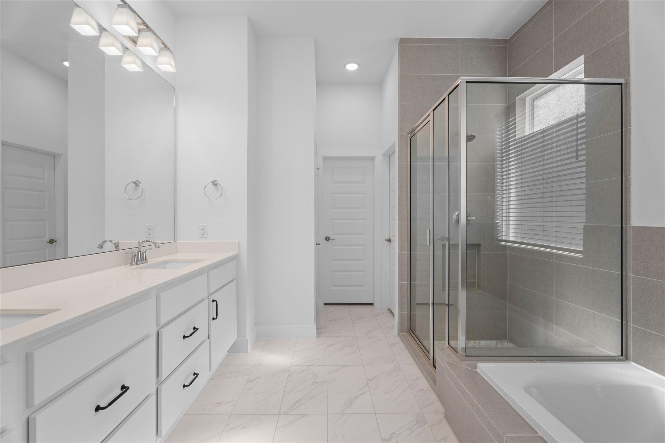 5030 Vly Wind Court Spring, TX 77386 - Photo 17 of 36 Primary ensuite with dual sinks.