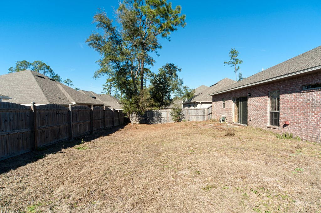 4625 Hermosa Road Crestview, FL 32539 - Photo 35 of 37 a view of a house with a snow in the yard