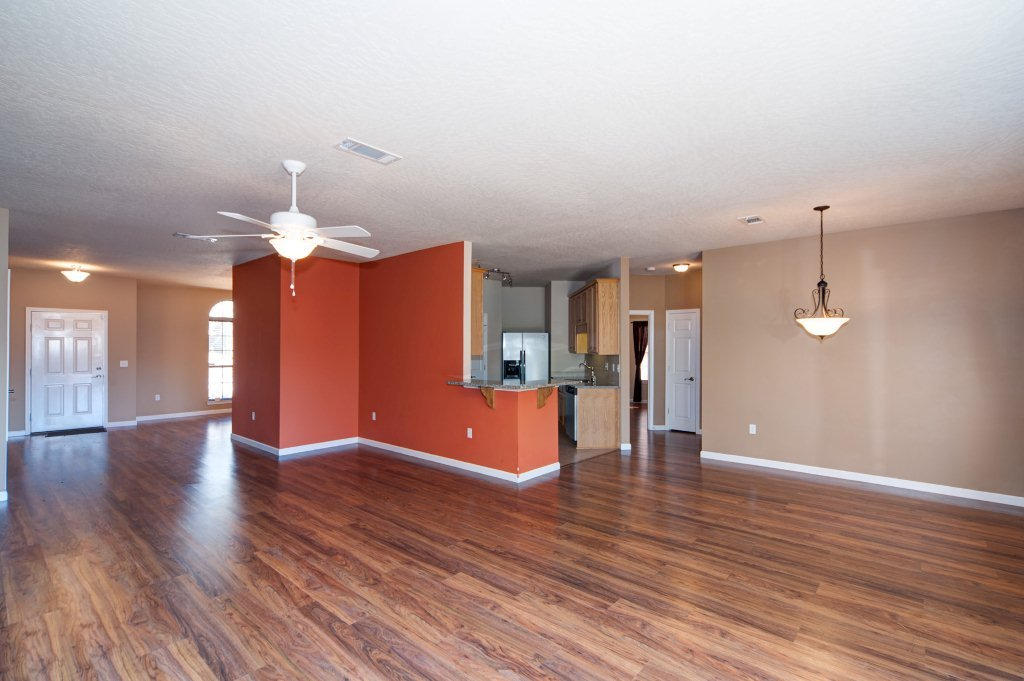 4625 Hermosa Road Crestview, FL 32539 - Photo 8 of 37 a view of an empty room with wooden floor