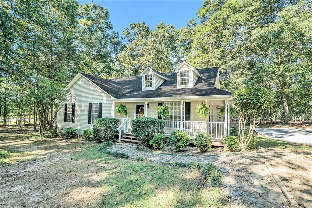1808 Diamond Hill Neese Road Hull, GA 30646 - Photo 1 of 1 a front view of a house with garden