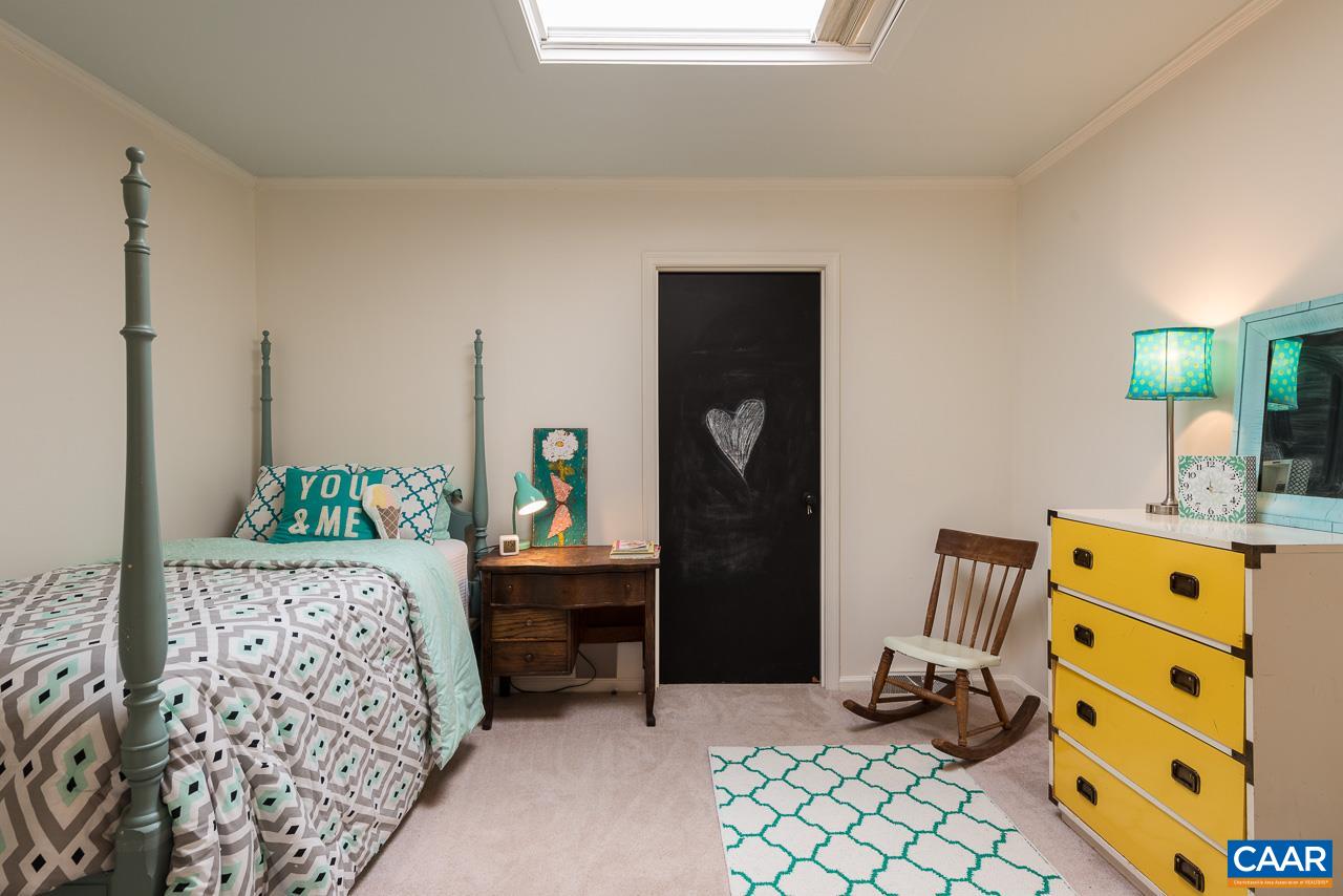 1314 Tilman Road Charlottesville, VA 22901 - Photo 15 of 27 The second bedroom has a large skylight with custom blind. A large walk-in closet provides ample storage.