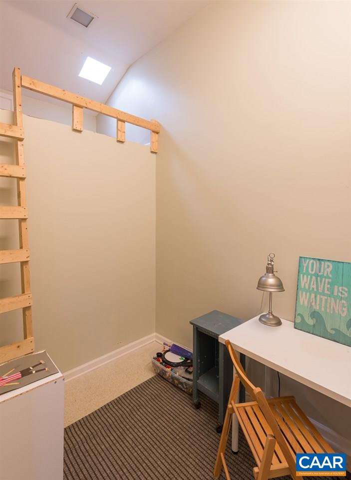 1314 Tilman Road Charlottesville, VA 22901 - Photo 17 of 27 Adjoining the third bedroom, this cozy room has a loft, with skylight, ideal as a quiet reading spot or "fort". There's also room for a study nook on the "main" floor.