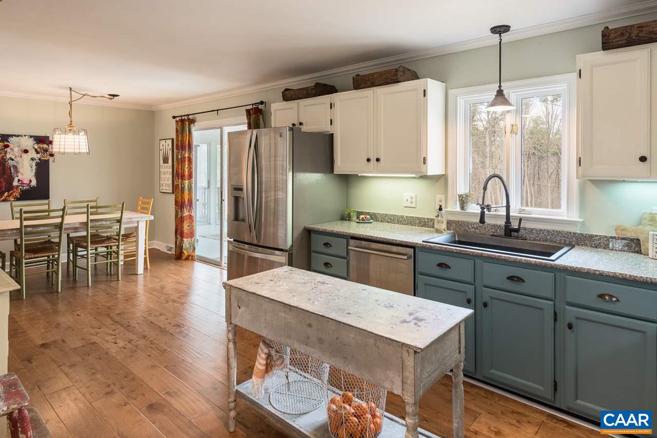 1314 Tilman Road Charlottesville, VA 22901 - Photo 7 of 27 The kitchen and breakfast area share a single large space.