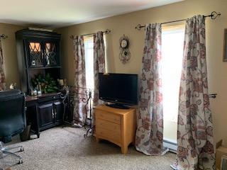320 Village Road Dallas, PA 18612 - Photo 18 of 29 a living room with furniture and a flat screen tv