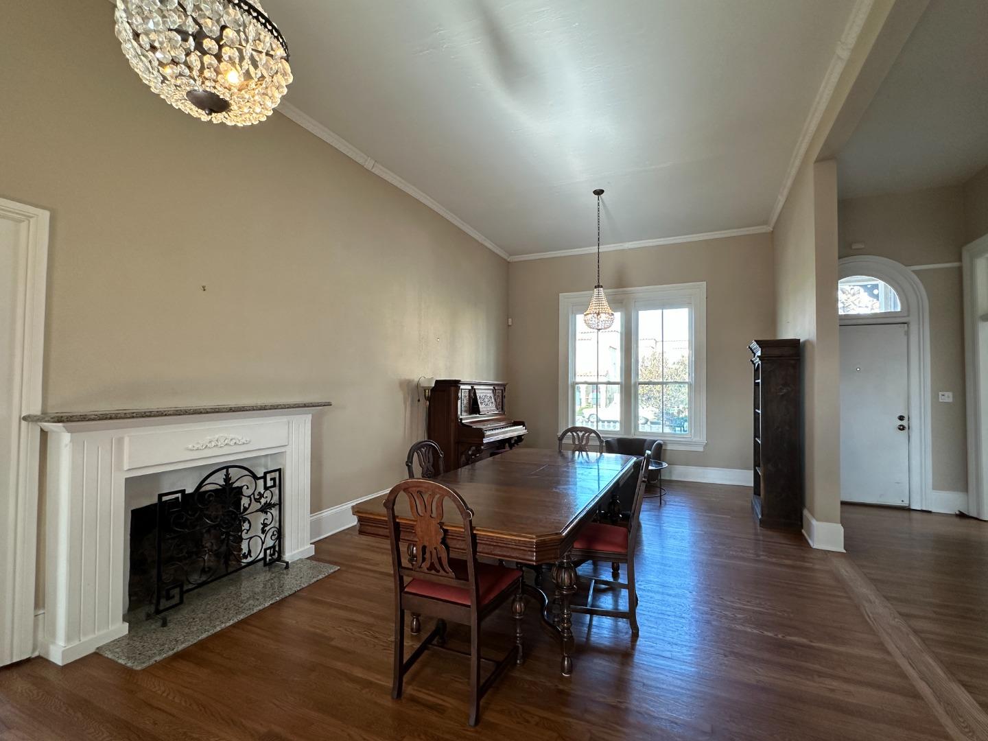 69 Geil Street Salinas, CA 93901 - Photo 11 of 34 a view of a dining room with furniture window and wooden floor