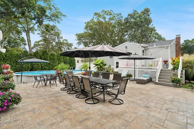 a view of a dinning table and chairs in the patio