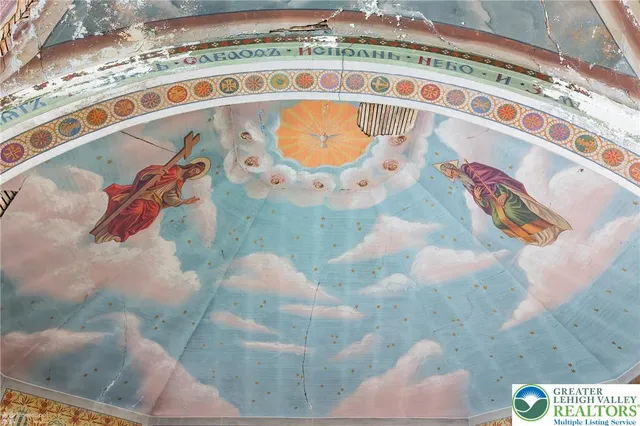 a bathroom with a toilet and a sink