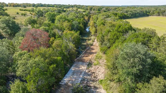 a view of a lake with an outdoor space