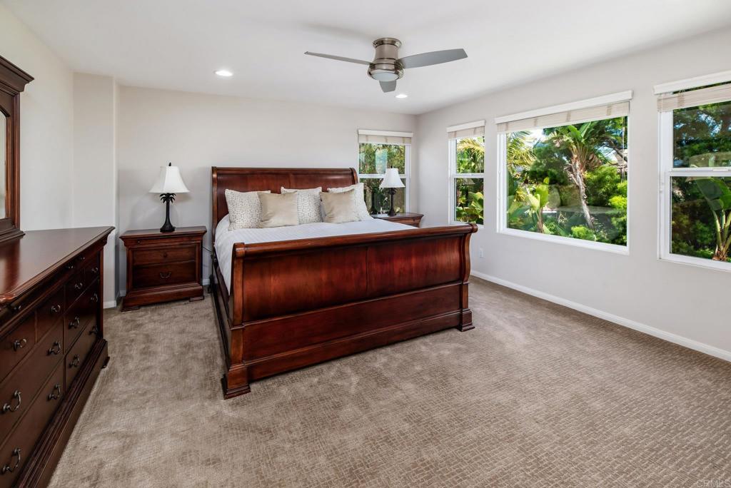 3434 Ravine Drive Carlsbad, CA 92010 - Photo 14 of 37 a bed room with a bed and a tv