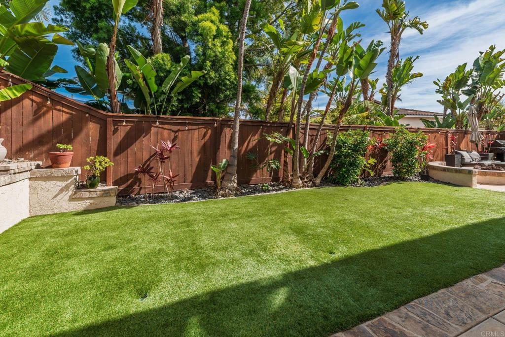 3434 Ravine Drive Carlsbad, CA 92010 - Photo 27 of 37 a view of backyard with wooden fence