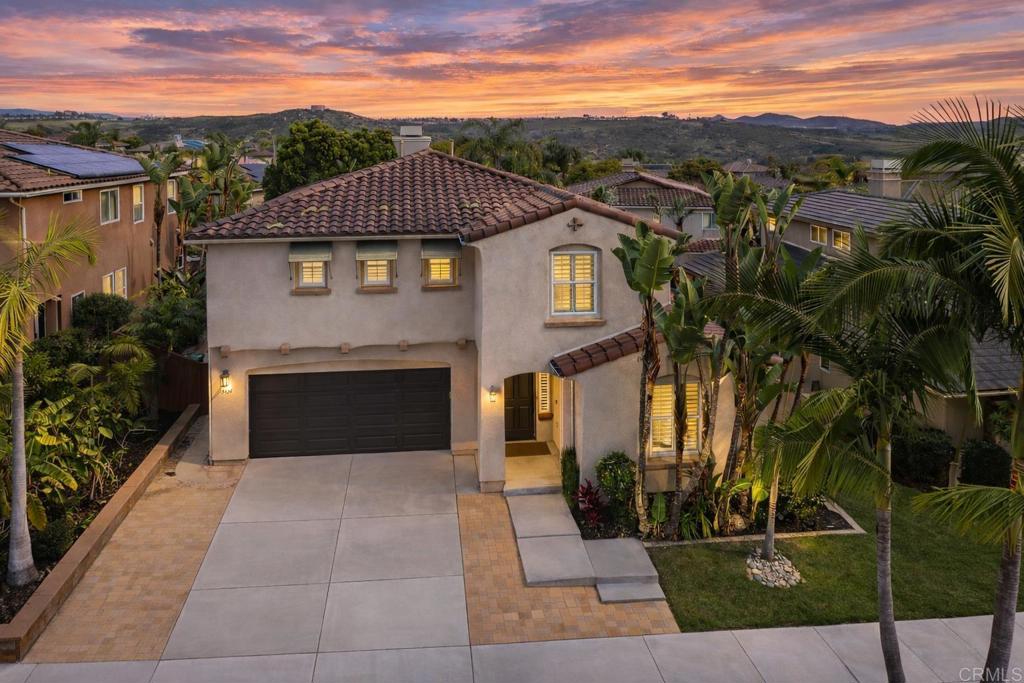 3434 Ravine Drive Carlsbad, CA 92010 - Photo 36 of 37 a front view of a house with a yard