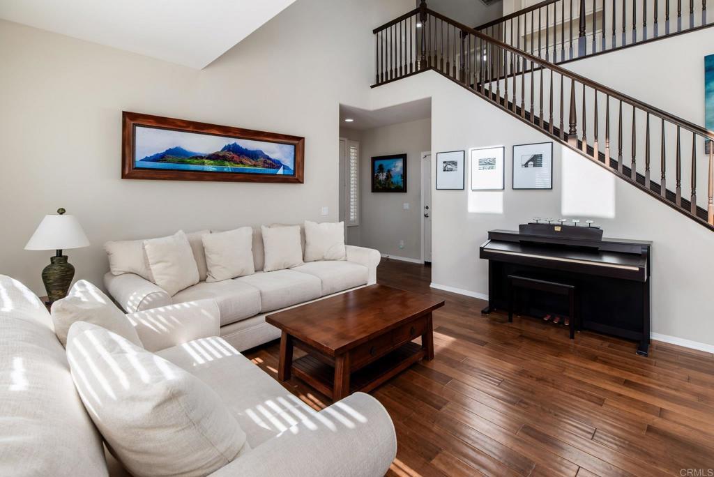 3434 Ravine Drive Carlsbad, CA 92010 - Photo 4 of 37 a living room with furniture and a wooden floor