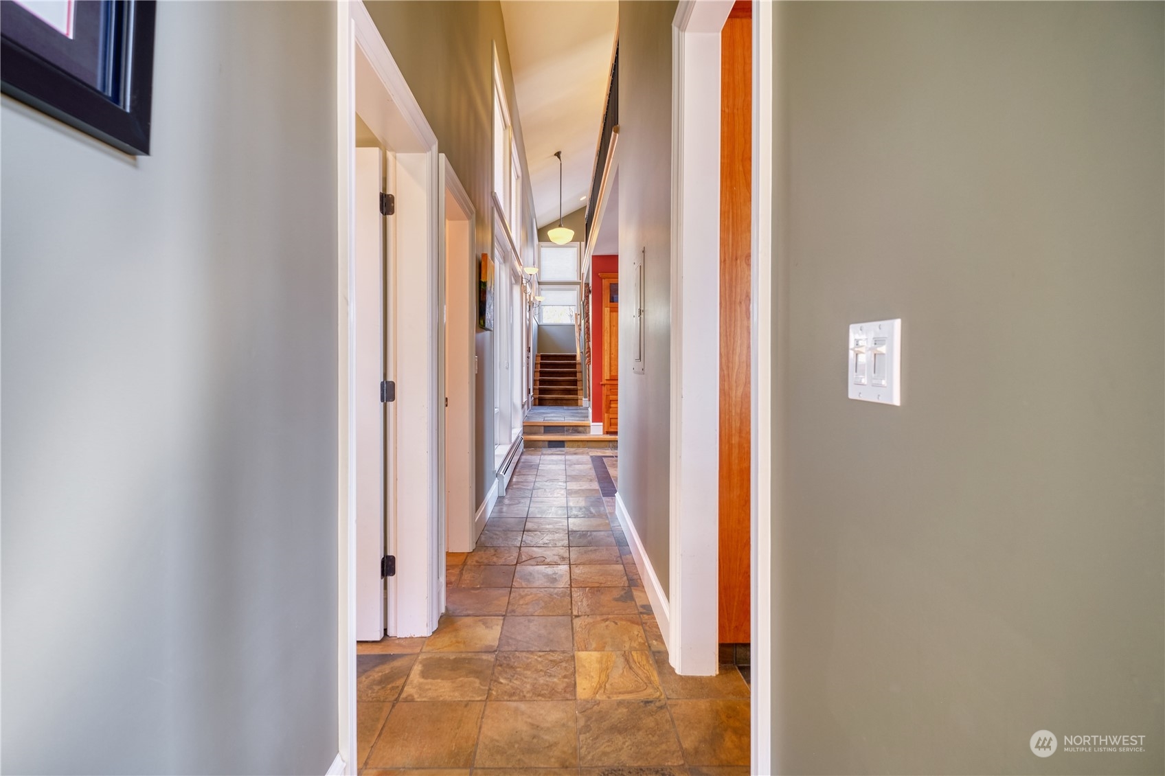 589 South Beach Road Point Roberts, WA 98281 - Photo 13 of 37 a view of a hallway with wooden floor and staircase