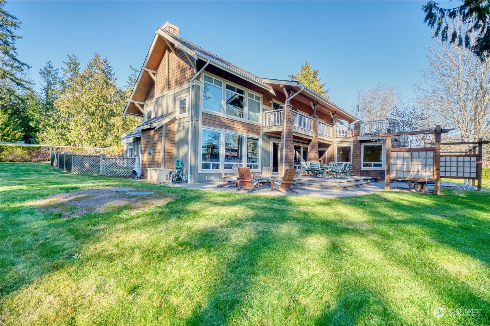 589 South Beach Road Point Roberts, WA 98281 - Photo 2 of 37 a view of an house with backyard and a tree
