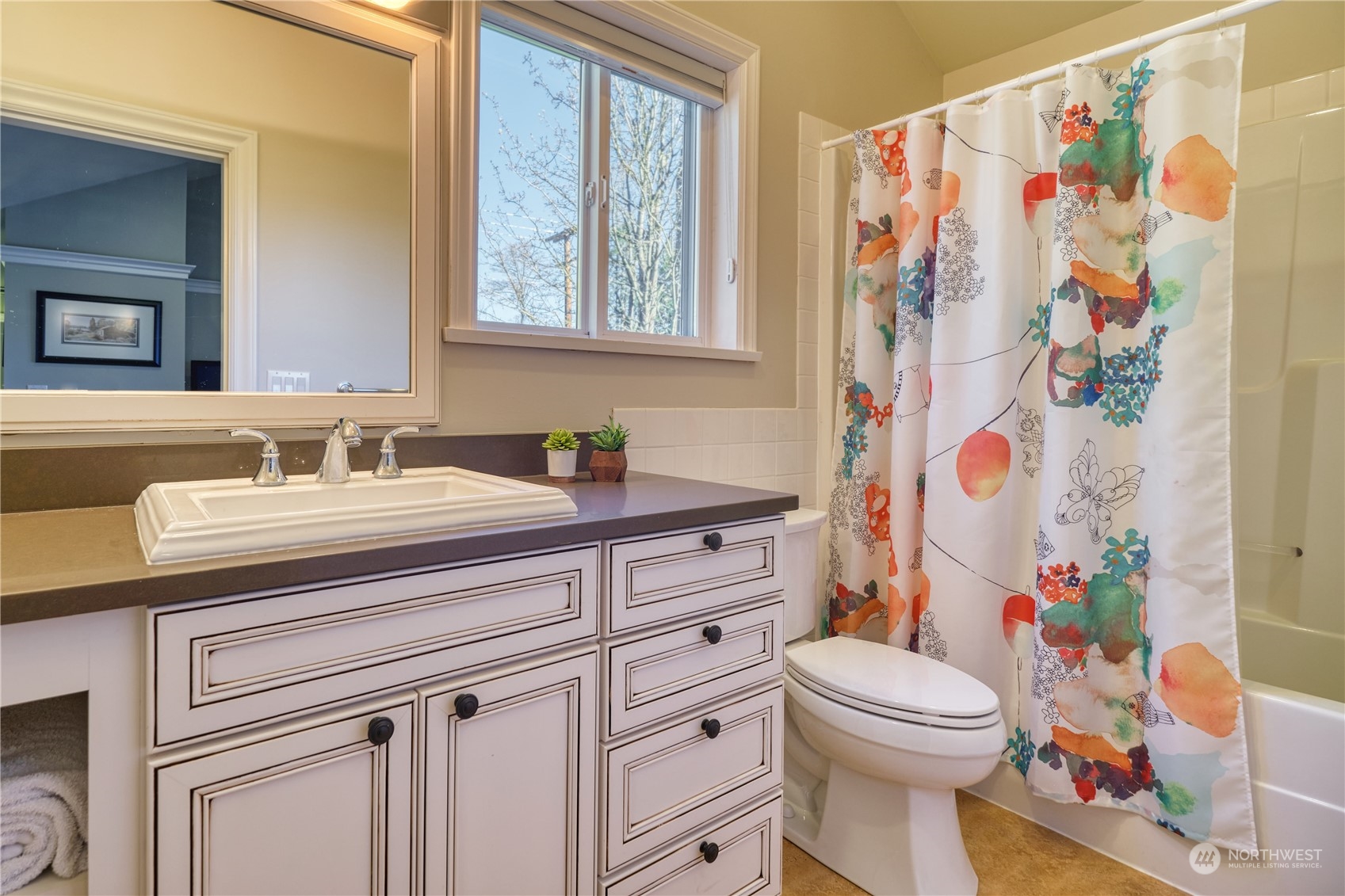 589 South Beach Road Point Roberts, WA 98281 - Photo 24 of 37 a bathroom with a sink a toilet and shower curtain