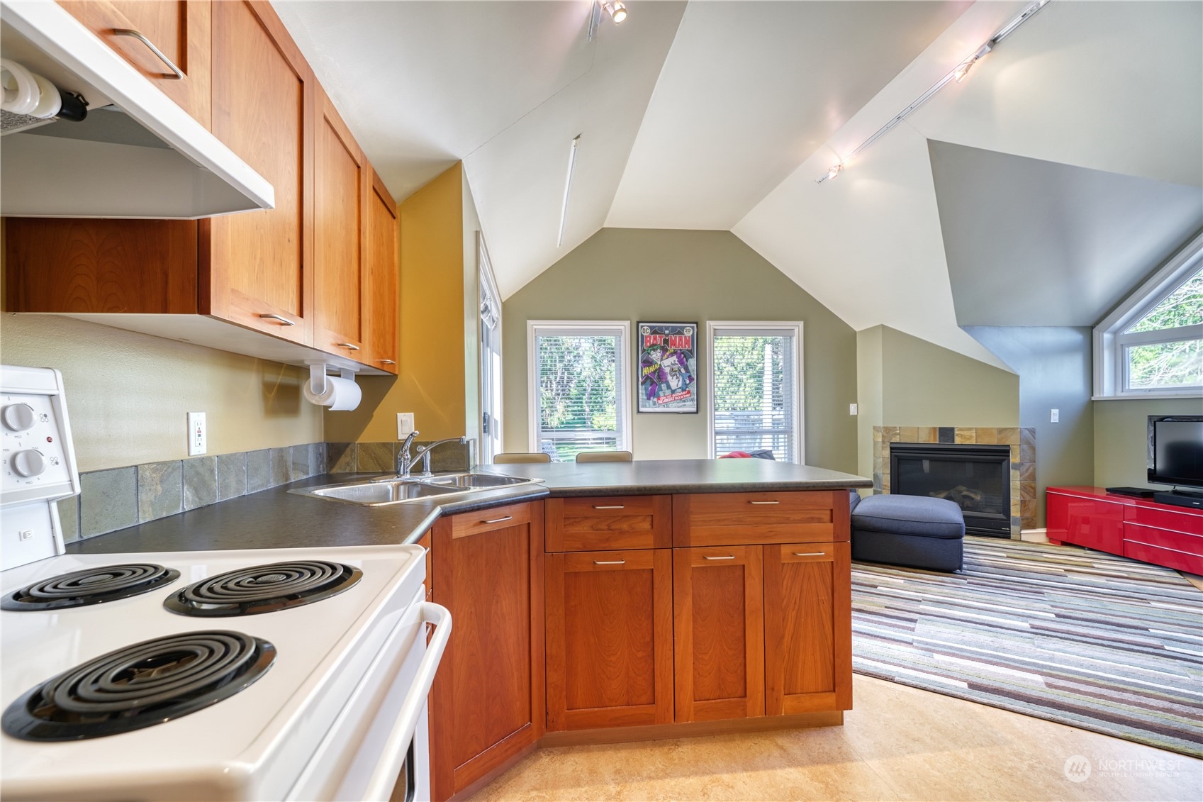 589 South Beach Road Point Roberts, WA 98281 - Photo 29 of 37 a kitchen with a stove and a sink