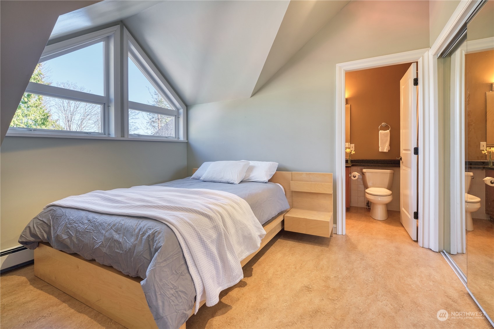 589 South Beach Road Point Roberts, WA 98281 - Photo 32 of 37 a bedroom with a bed and a window