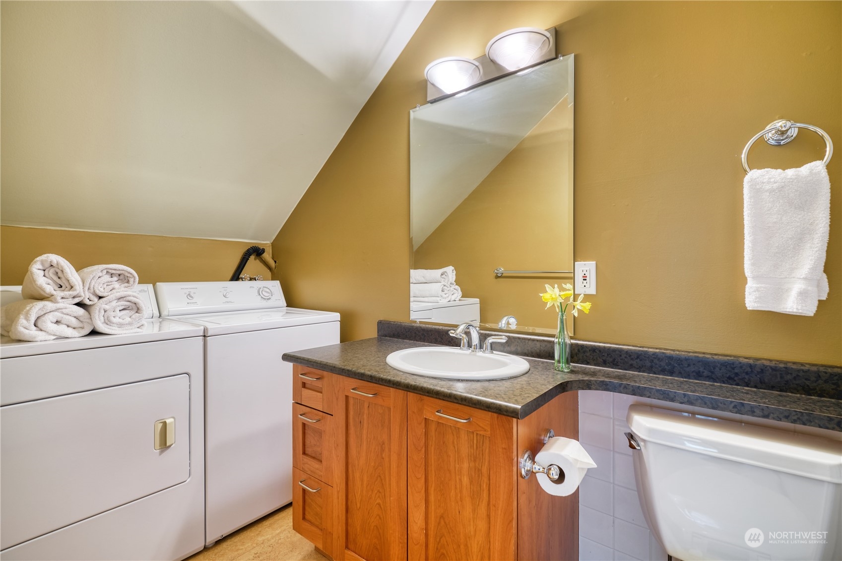 589 South Beach Road Point Roberts, WA 98281 - Photo 33 of 37 a bathroom with a sink and a mirror