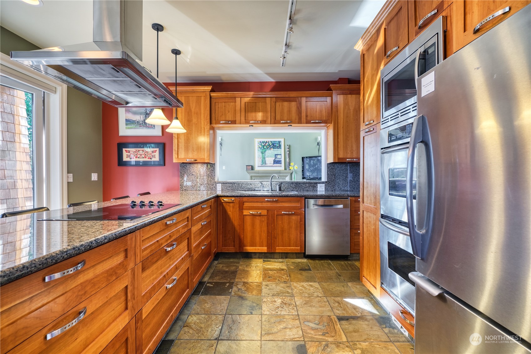589 South Beach Road Point Roberts, WA 98281 - Photo 7 of 37 a large kitchen with stainless steel appliances granite countertop a refrigerator and a stove
