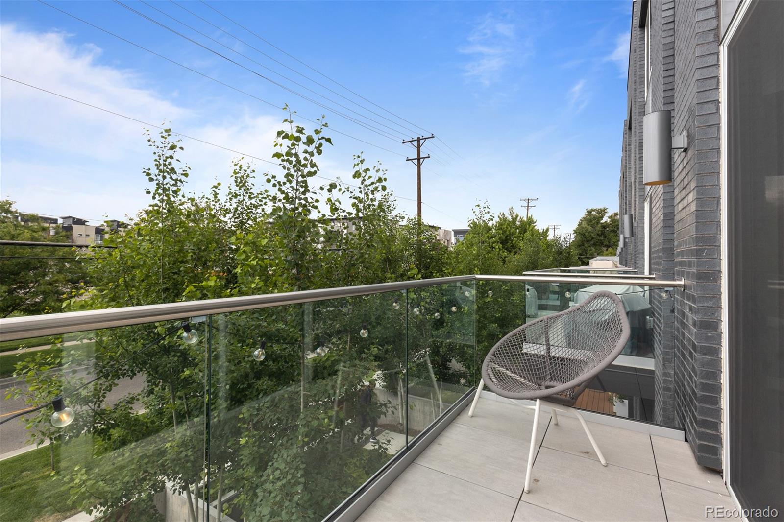 1608 Irving Street Denver, CO 80204 - Photo 20 of 37 a balcony with table and chairs