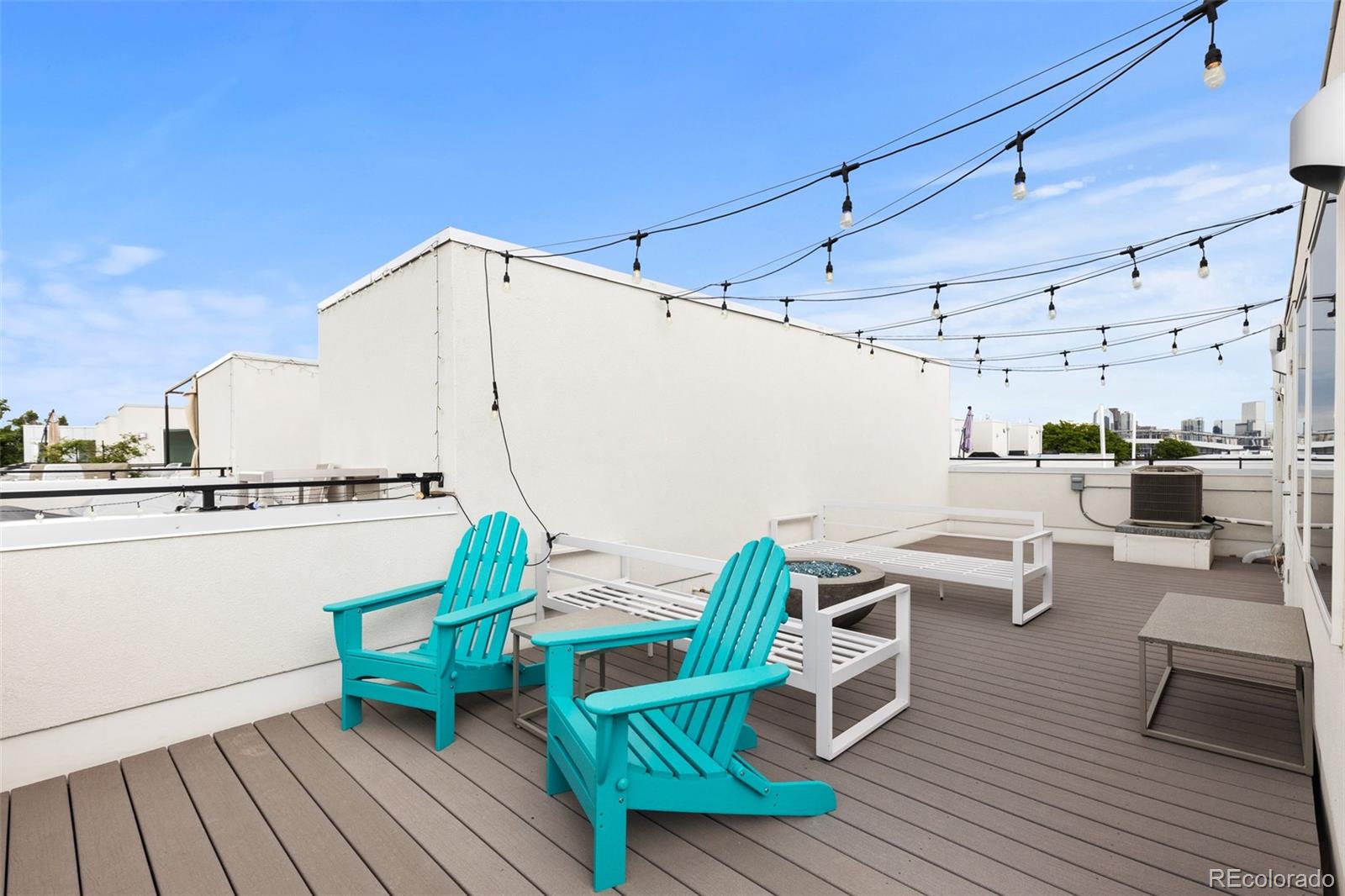 1608 Irving Street Denver, CO 80204 - Photo 33 of 37 a view of a chairs and table on the deck