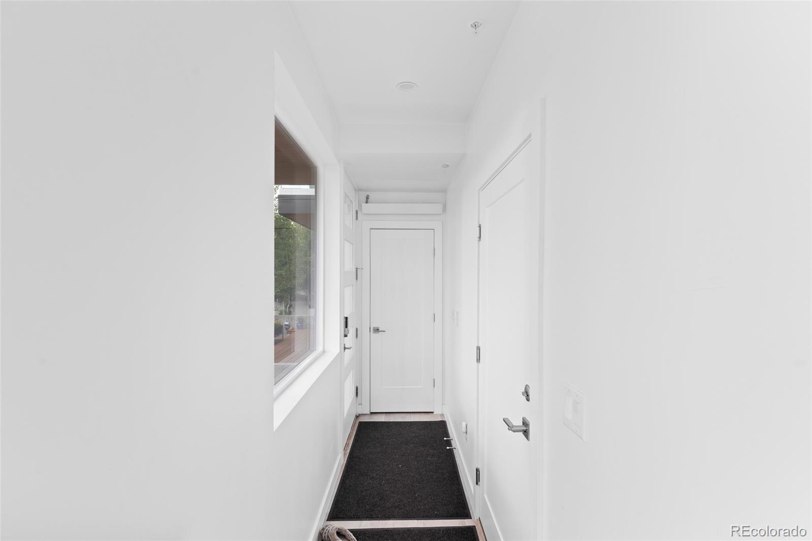 1608 Irving Street Denver, CO 80204 - Photo 4 of 37 a view of a hallway