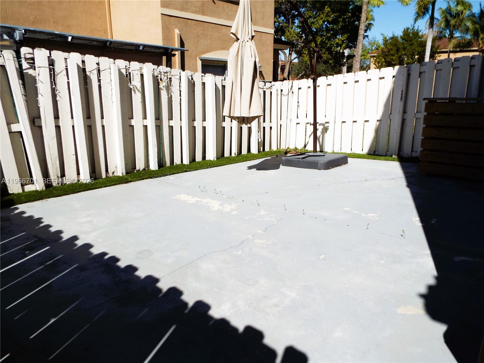 21470 Southwest 85th Path Cutler Bay, FL 33189 - Photo 48 of 50 a view of a backyard of the house