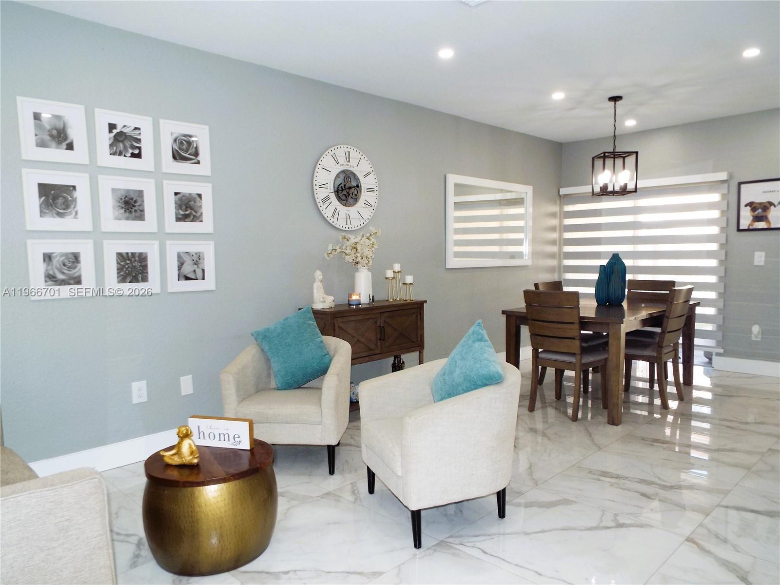 21470 Southwest 85th Path Cutler Bay, FL 33189 - Photo 6 of 50 a dining room with furniture and window
