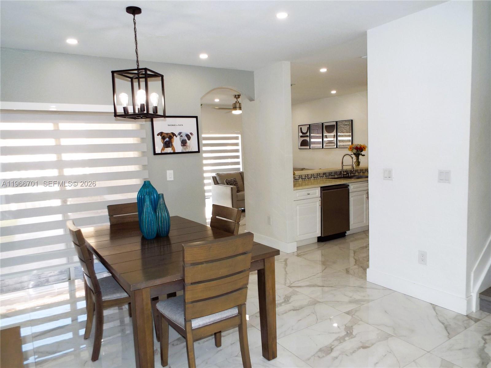 21470 Southwest 85th Path Cutler Bay, FL 33189 - Photo 9 of 50 a view of kitchen with breakfast area