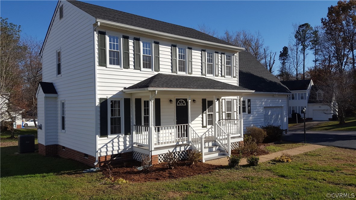 1613 Wilson Wood Road Midlothian, VA 23114 - Photo 1 of 37 a front view of a house with a yard