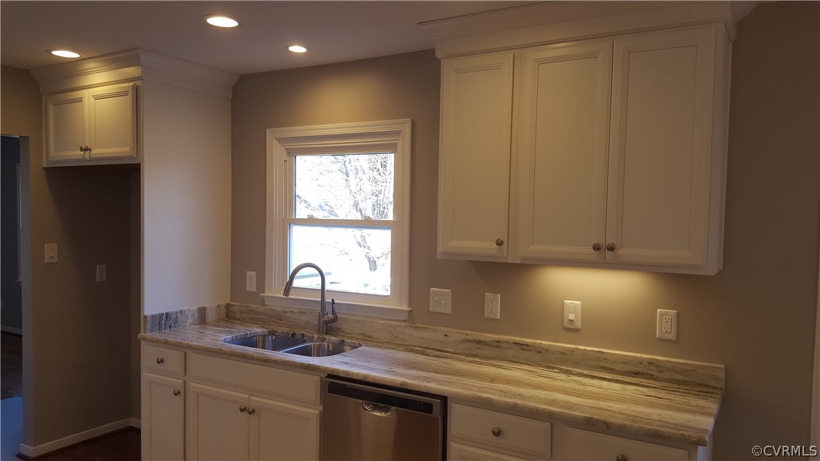 1613 Wilson Wood Road Midlothian, VA 23114 - Photo 13 of 37 a kitchen with a sink and cabinets