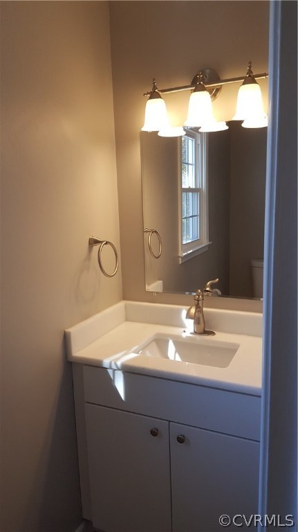 1613 Wilson Wood Road Midlothian, VA 23114 - Photo 16 of 37 a bathroom with a sink and a mirror
