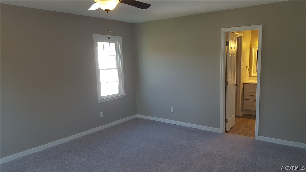 1613 Wilson Wood Road Midlothian, VA 23114 - Photo 17 of 37 an empty room that has a window in it