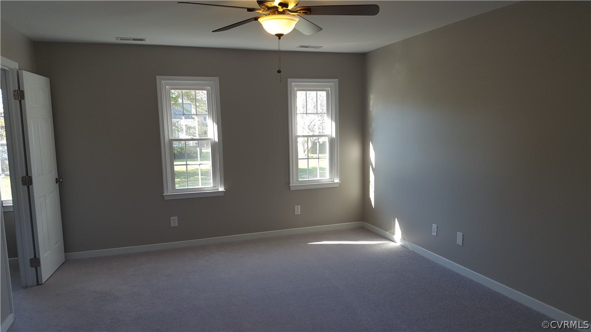 1613 Wilson Wood Road Midlothian, VA 23114 - Photo 18 of 37 an empty room that has a window