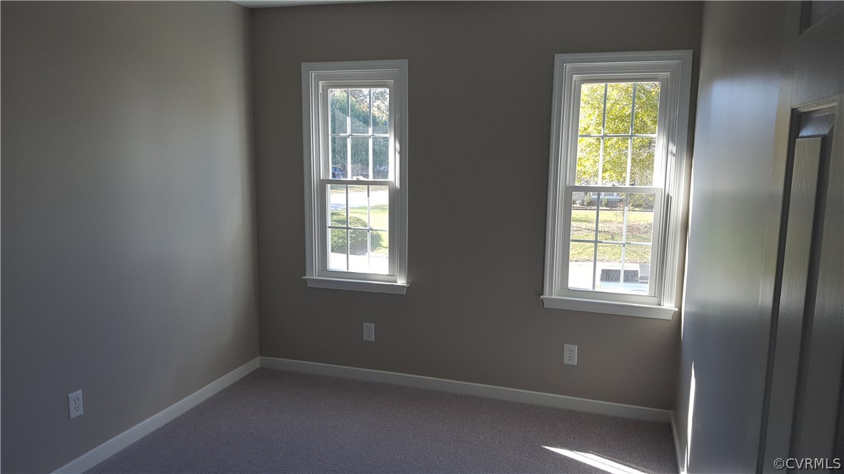 1613 Wilson Wood Road Midlothian, VA 23114 - Photo 23 of 37 an empty room with windows