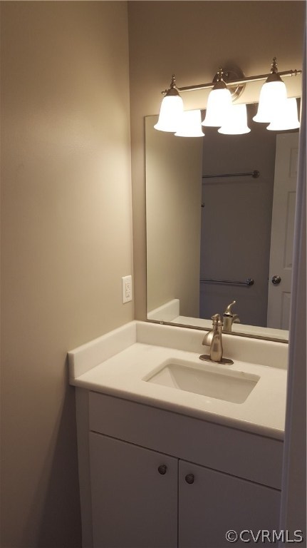 1613 Wilson Wood Road Midlothian, VA 23114 - Photo 28 of 37 a bathroom with a sink and mirror