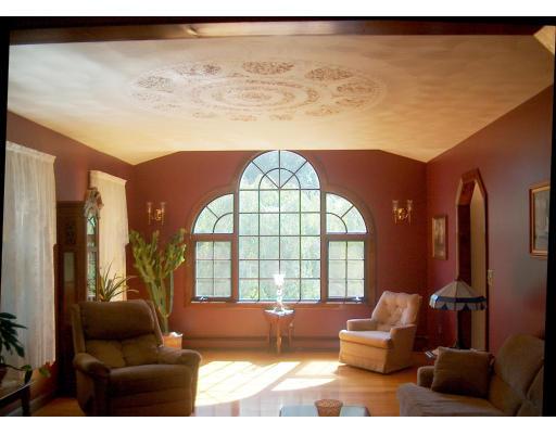 143 Colburn Road Charlton, MA 01507 - Photo 10 of 27 a living room with furniture and a large window