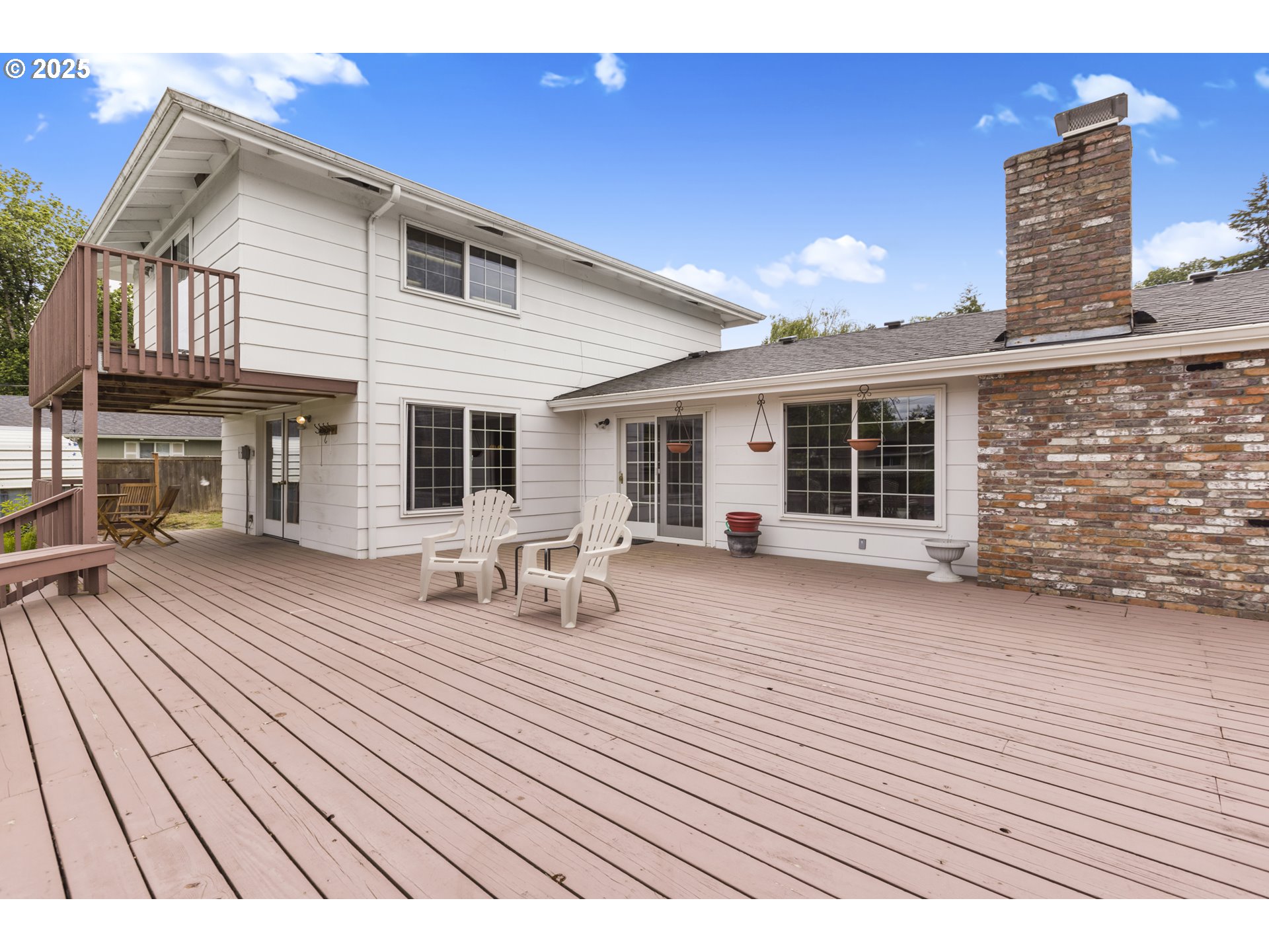 2055 Ridgeway Drive Eugene, OR 97401 - Photo 32 of 48 a view of a house with wooden deck