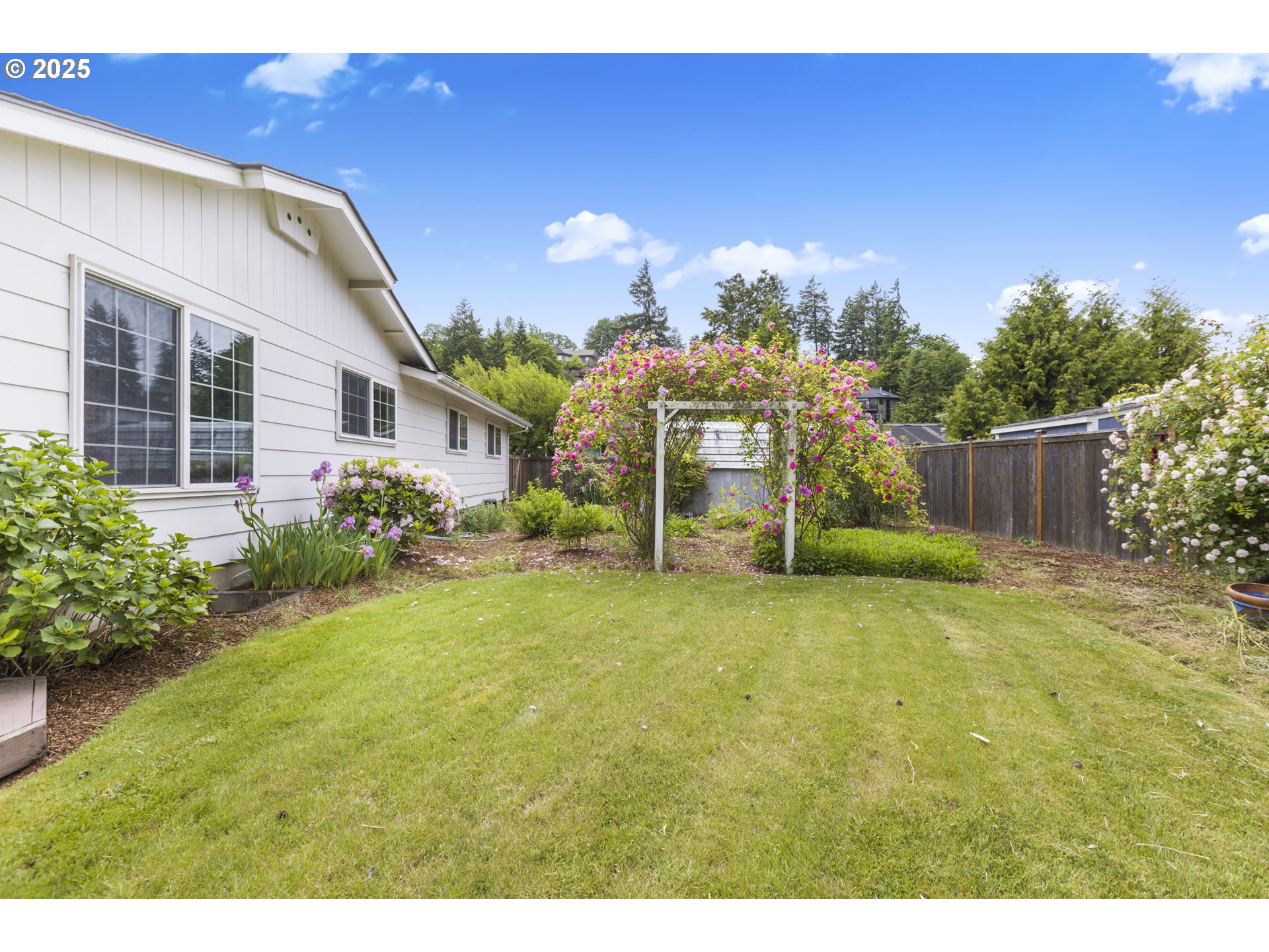 2055 Ridgeway Drive Eugene, OR 97401 - Photo 36 of 48 a house with trees in front of it