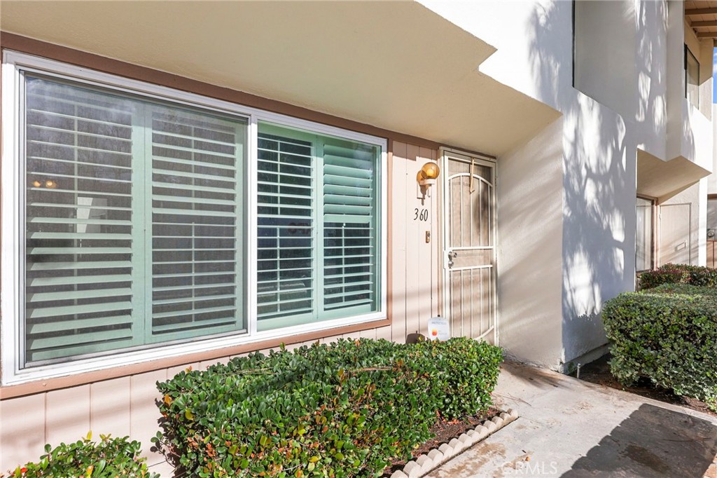 360 Meadow Court Brea, CA 92821 - Photo 6 of 41 Large front window with dual pane window and plantation shutters to reduce noise