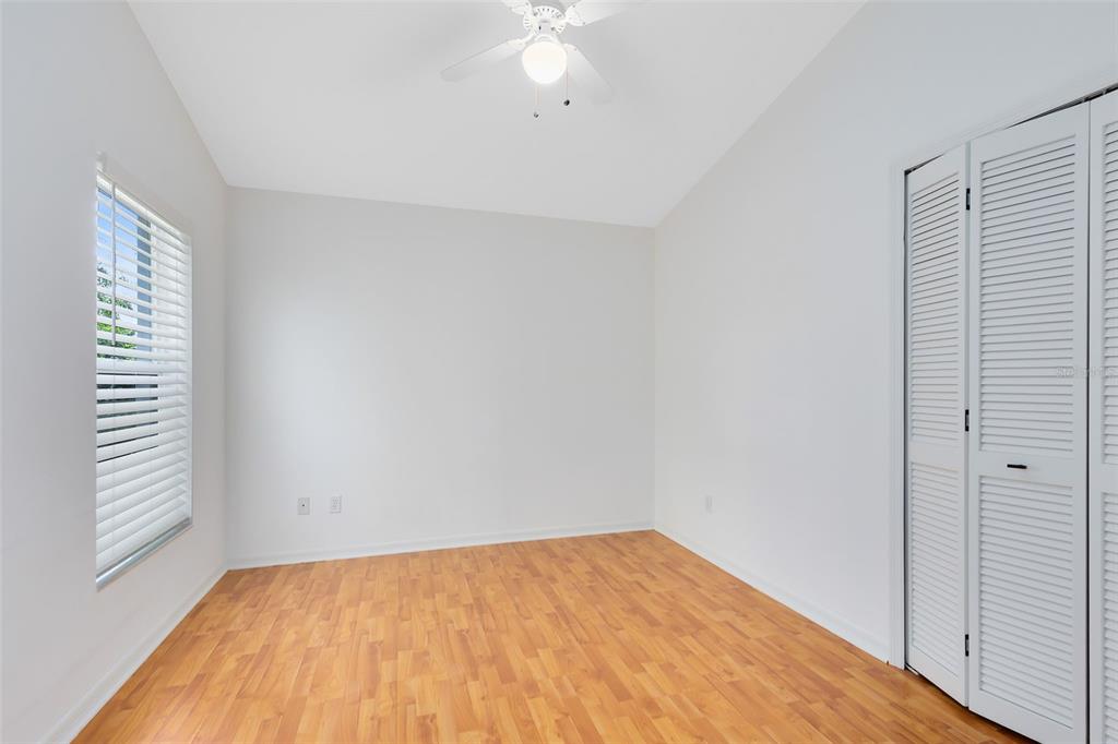 5809 Donnelly Circle Orlando, FL 32821 - Photo 18 of 22 a view of an empty room with a window